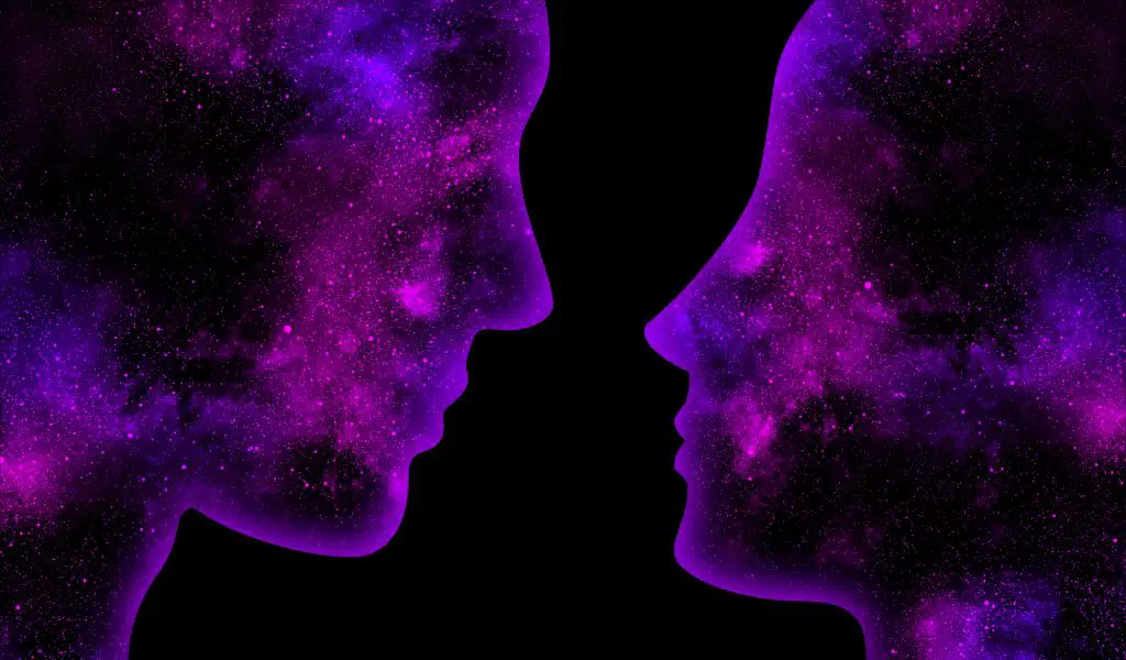 Purple space man and woman look at each other on a black background