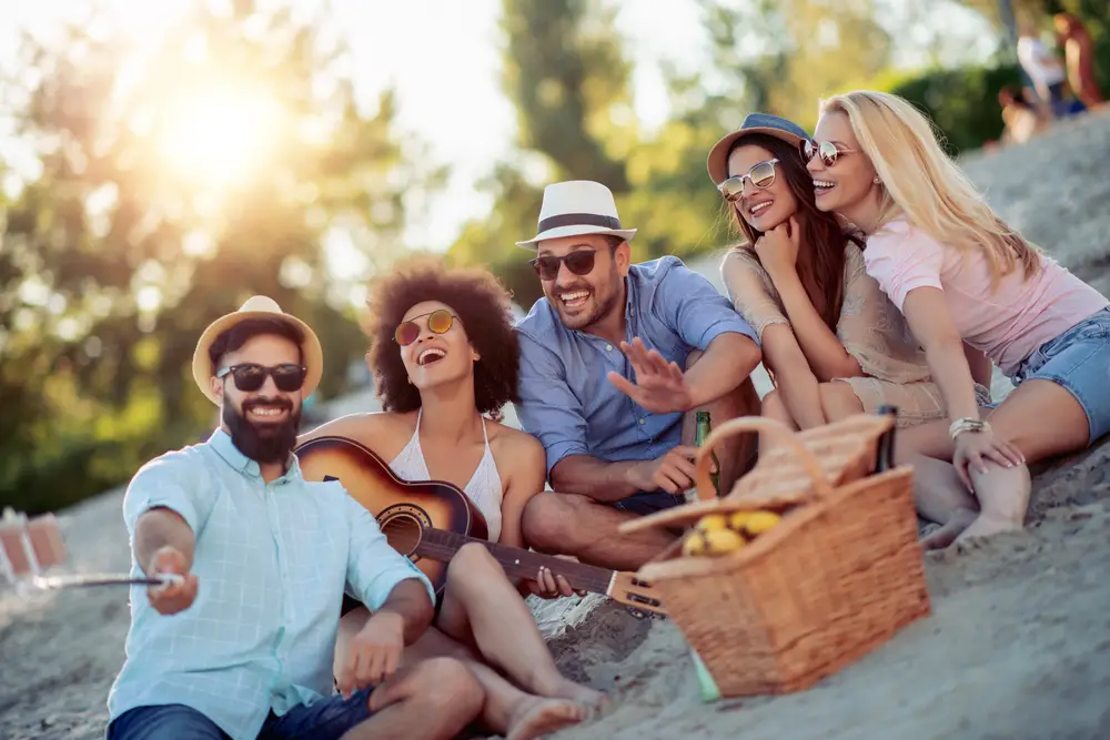 friends having a picnic at the beach